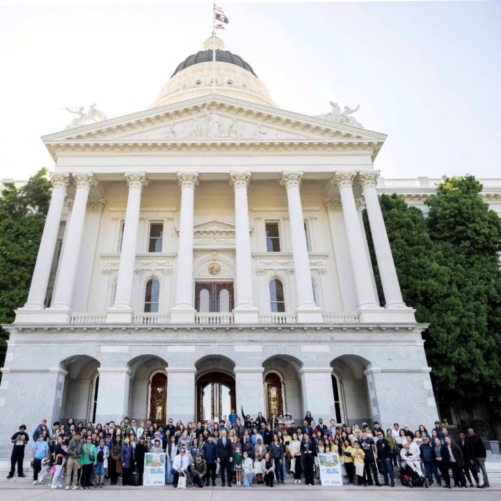 Senator Cortese photographed with attendees at 23rd Annual Sacramento Bus Trip for Education.