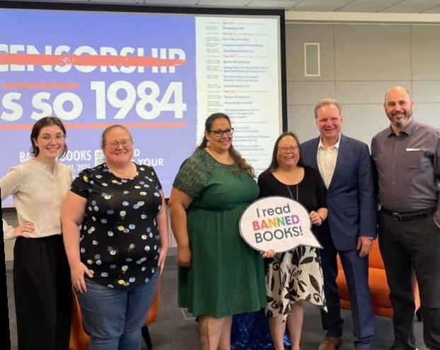 Senator Cortese photographed with community leaders at Banned Books Event
