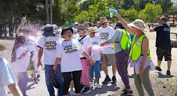 Image of older adults celebrating at a prior year’s Color Walk