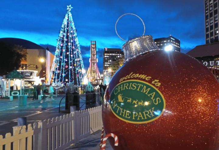 Festive photograph reading “Welcome to Christmas in the Park”