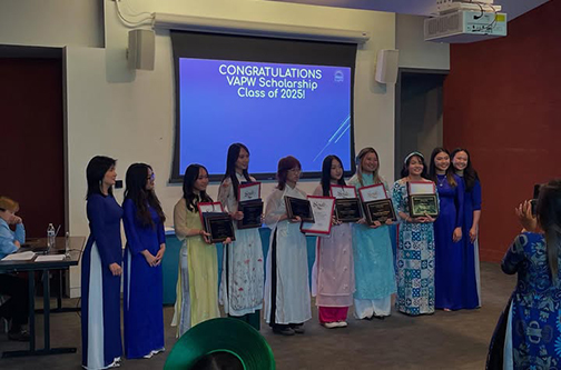 Scholarship awardees photographed with Senate certificates
