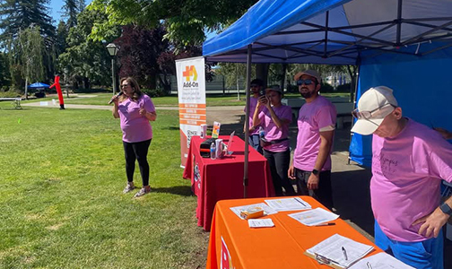 Leaders of Pragnya for Autism speaking and tabling at the “NeurOlympics” event