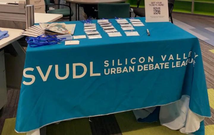 Photograph of SVUDL’s table at the new office celebration