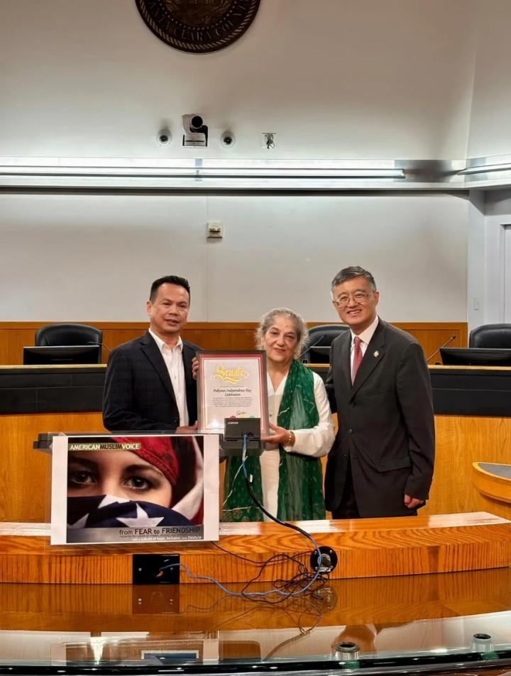 Staffer Phuong Nguyen photographed with Samina Sundas and Otto Lee