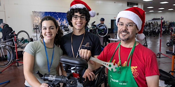Photograph of three members of Turning Wheels for Kids
