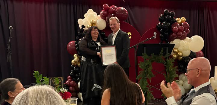 Senator Cortese presenting a certificate at Indian Health Center of Santa Clara Valley annual gala.