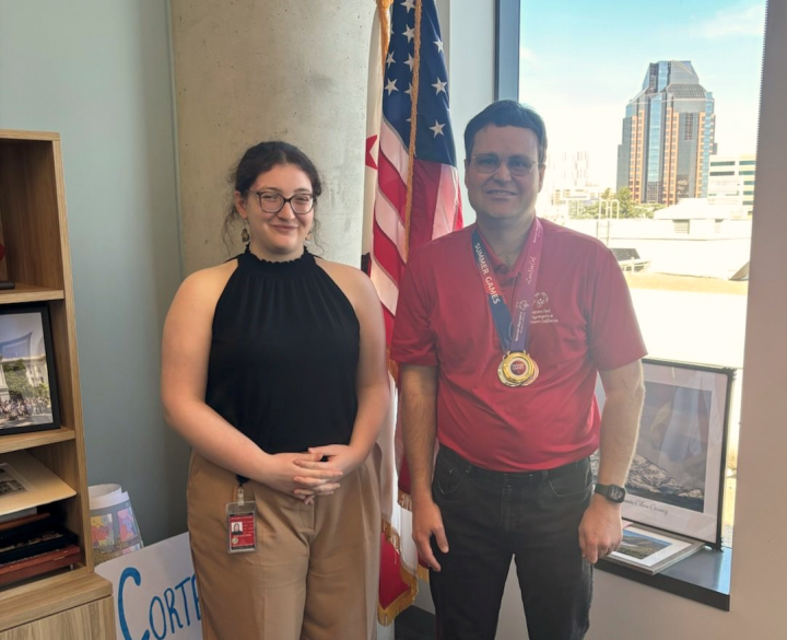 Legislative Aide Anastasia Hatzakos with athlete William Thomas Murray