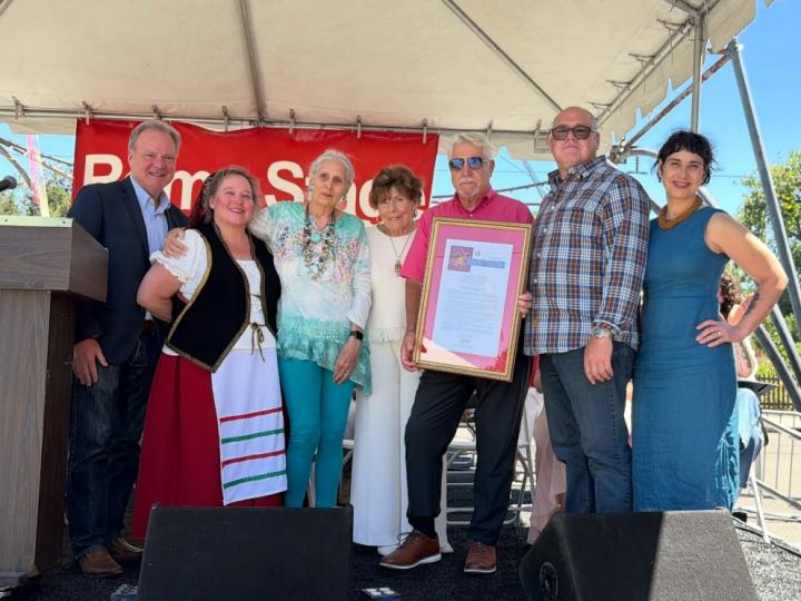 Senator Cortese presenting a Senate Resolution to the family of the late Rod Diridon, Sr. at the Italian Family Festa