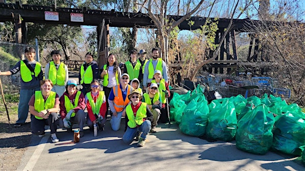 Photograph of constituents at a former creek cleanup event