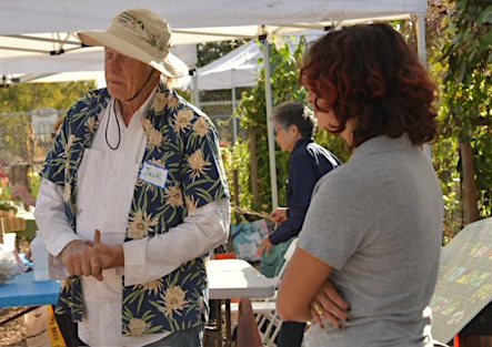 Volunteers photographed at a composting event