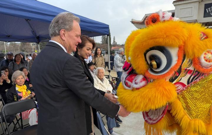 Senator Cortese with a Vietnamese Dragon at local Tết celebration