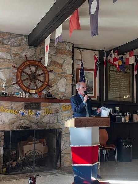 Steve Eckert speaking at a podium during his Alum Rock Counseling Center Retirement Celebration